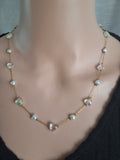 Collier Cœur de Nacre – Perles blanches & reflets irisés