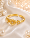 Bague 3 fleurs de cerisier floraison dorée