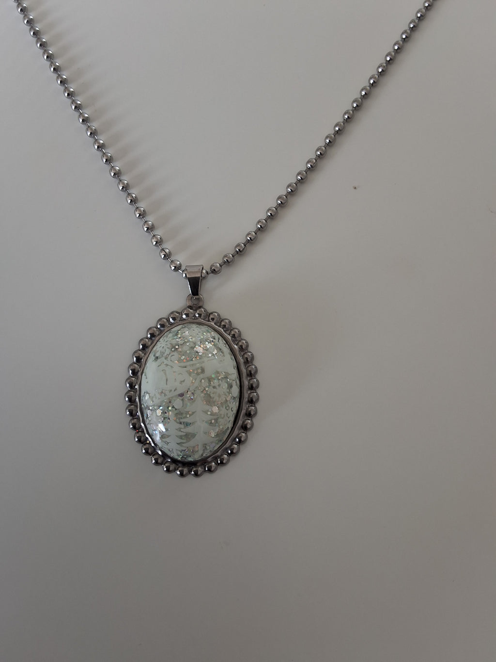Collier Père Noël – Magie de Noël Scintillante
