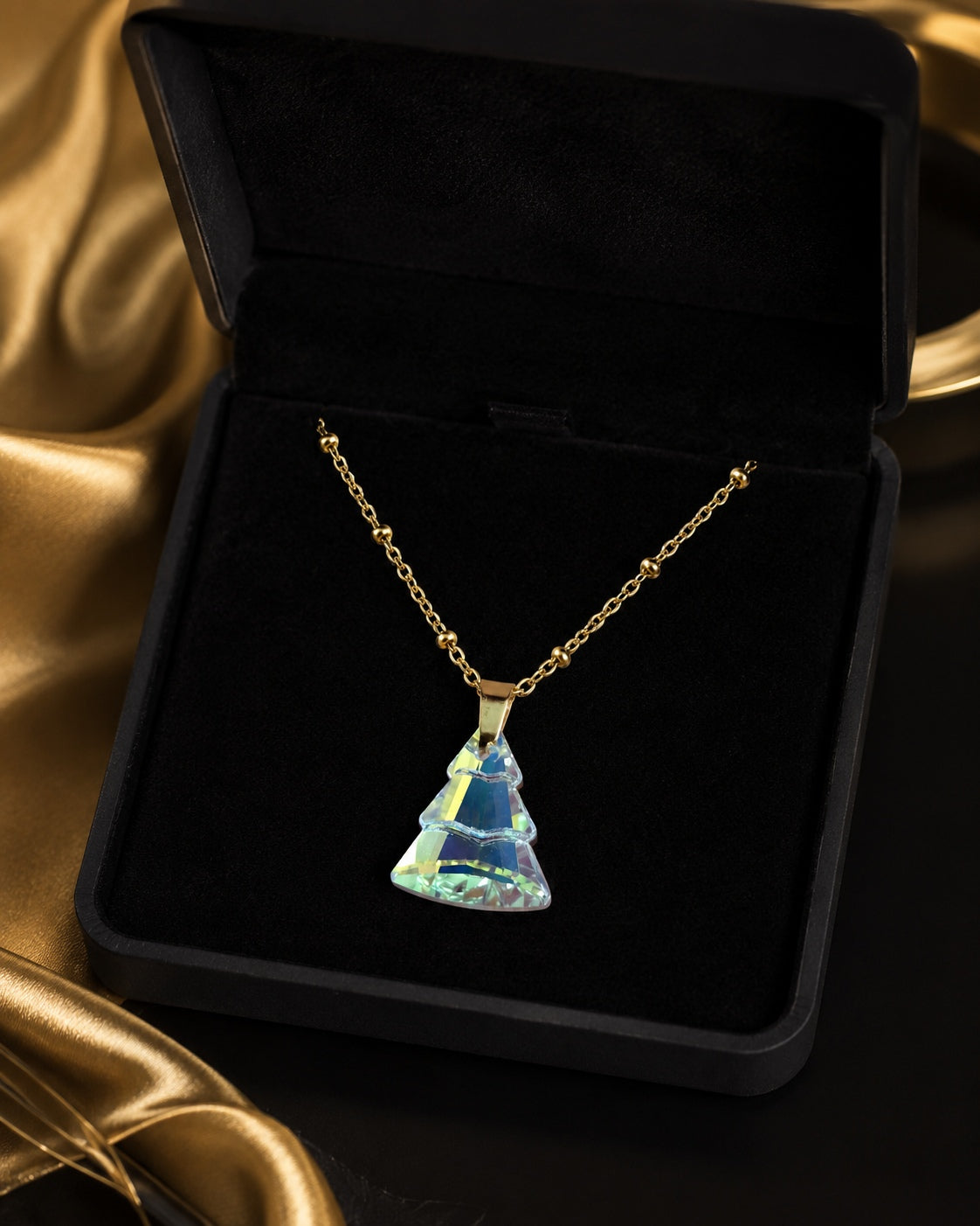 Le collier sapin en cristal doré