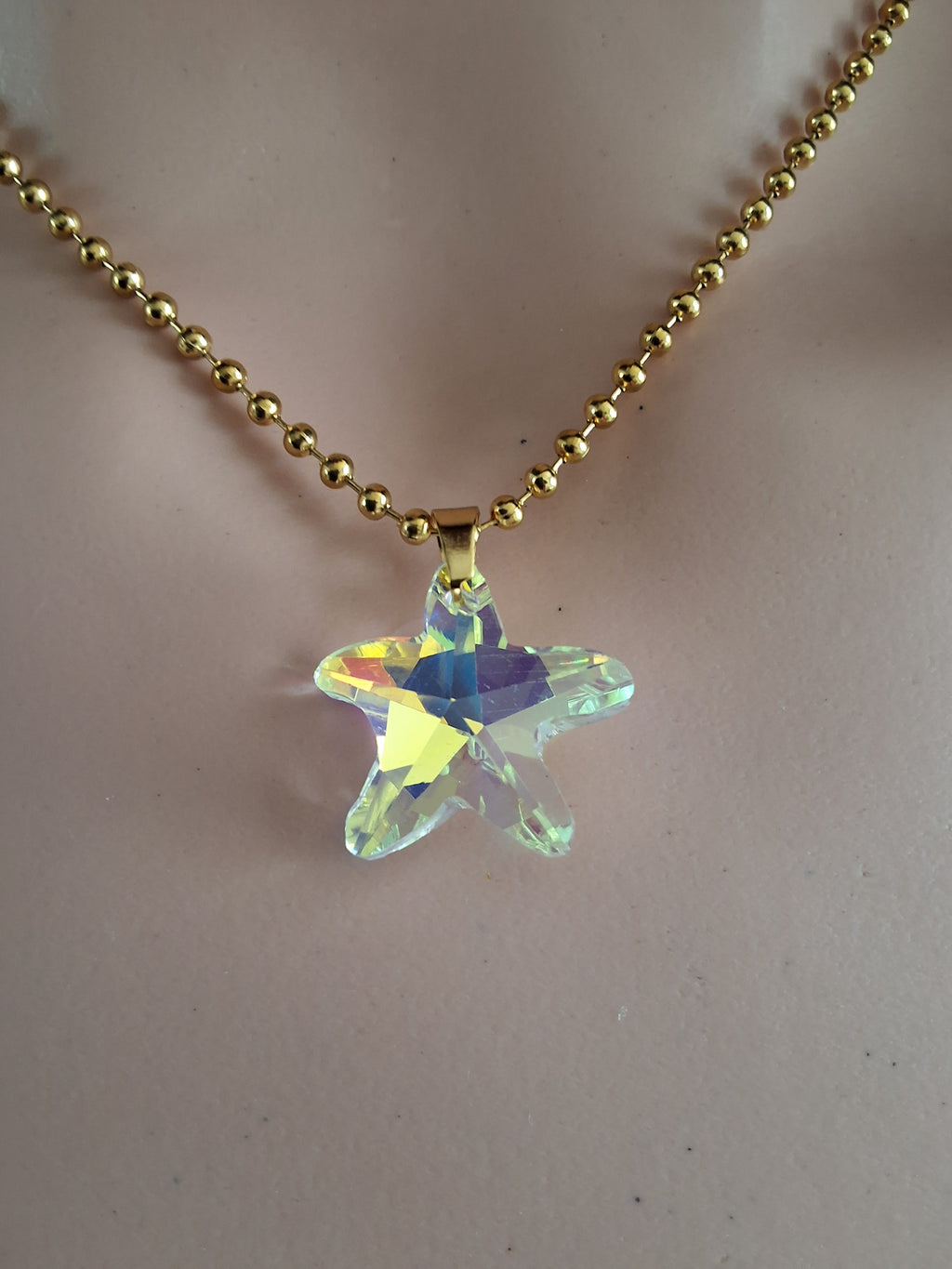 Collier grosse étoile de mer en cristal or