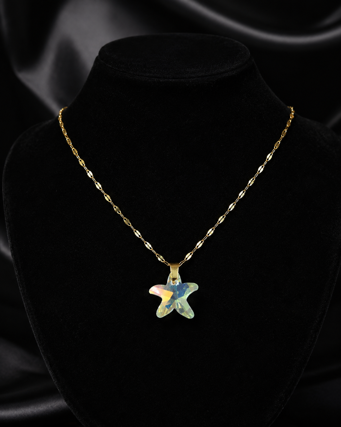 Le collier petite étoile marine en cristal doré