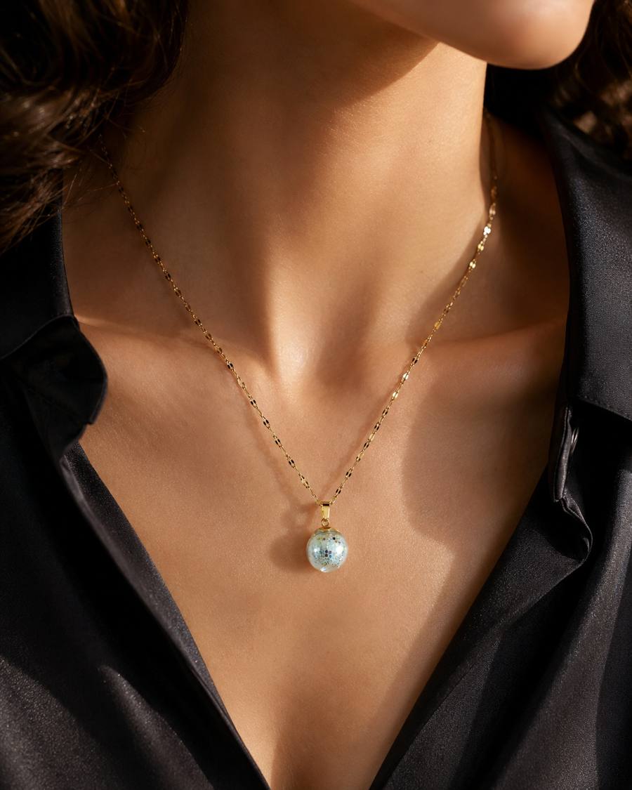Collier or enchanté prunelle verte