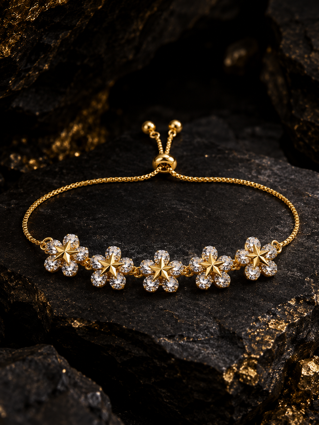Bracelet floral étoilé doré à 5 oxydes.