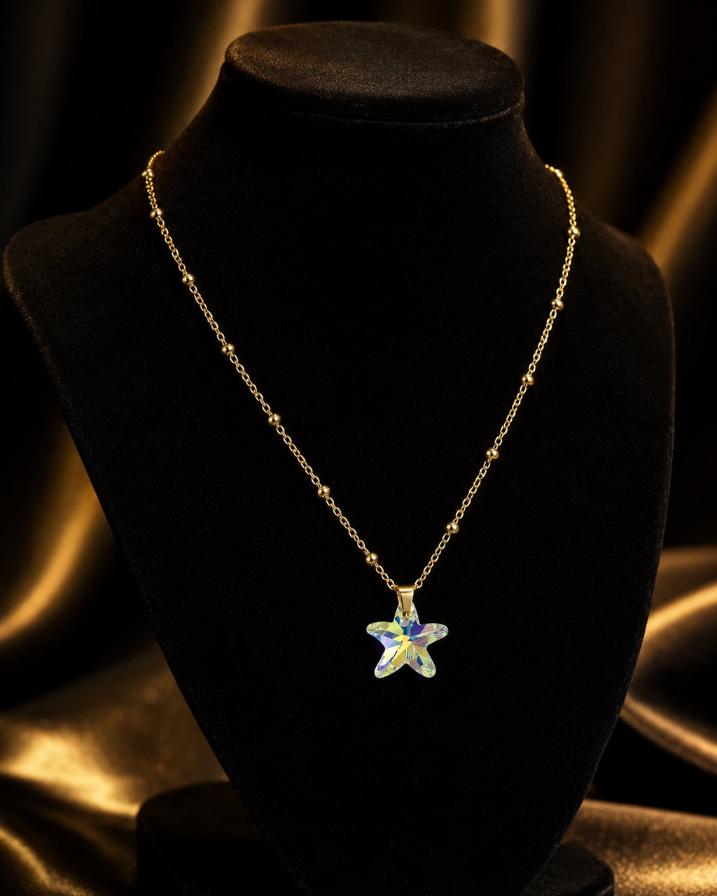 Le collier petite étoile de mer en cristal doré