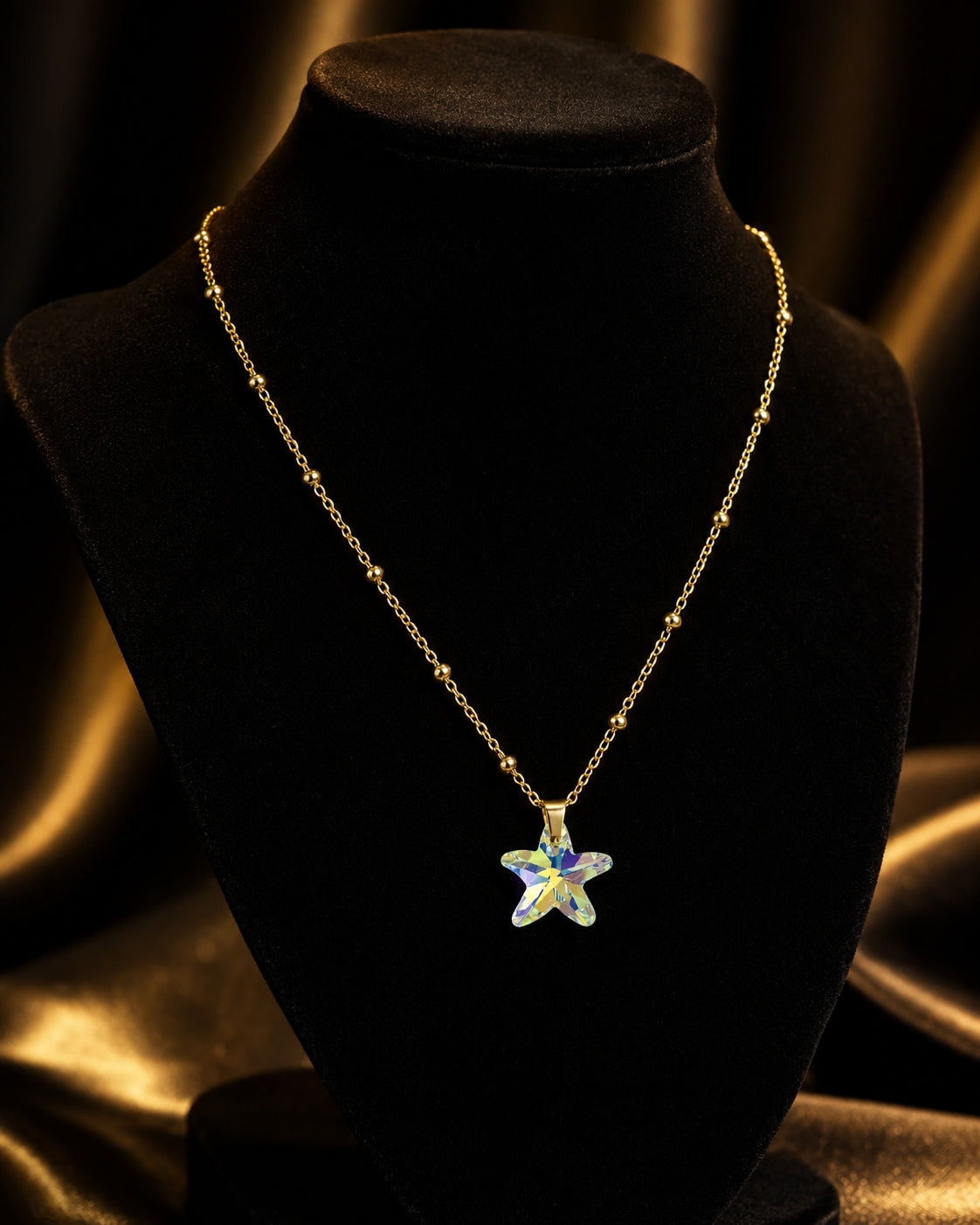 Le collier petite étoile de mer en cristal doré