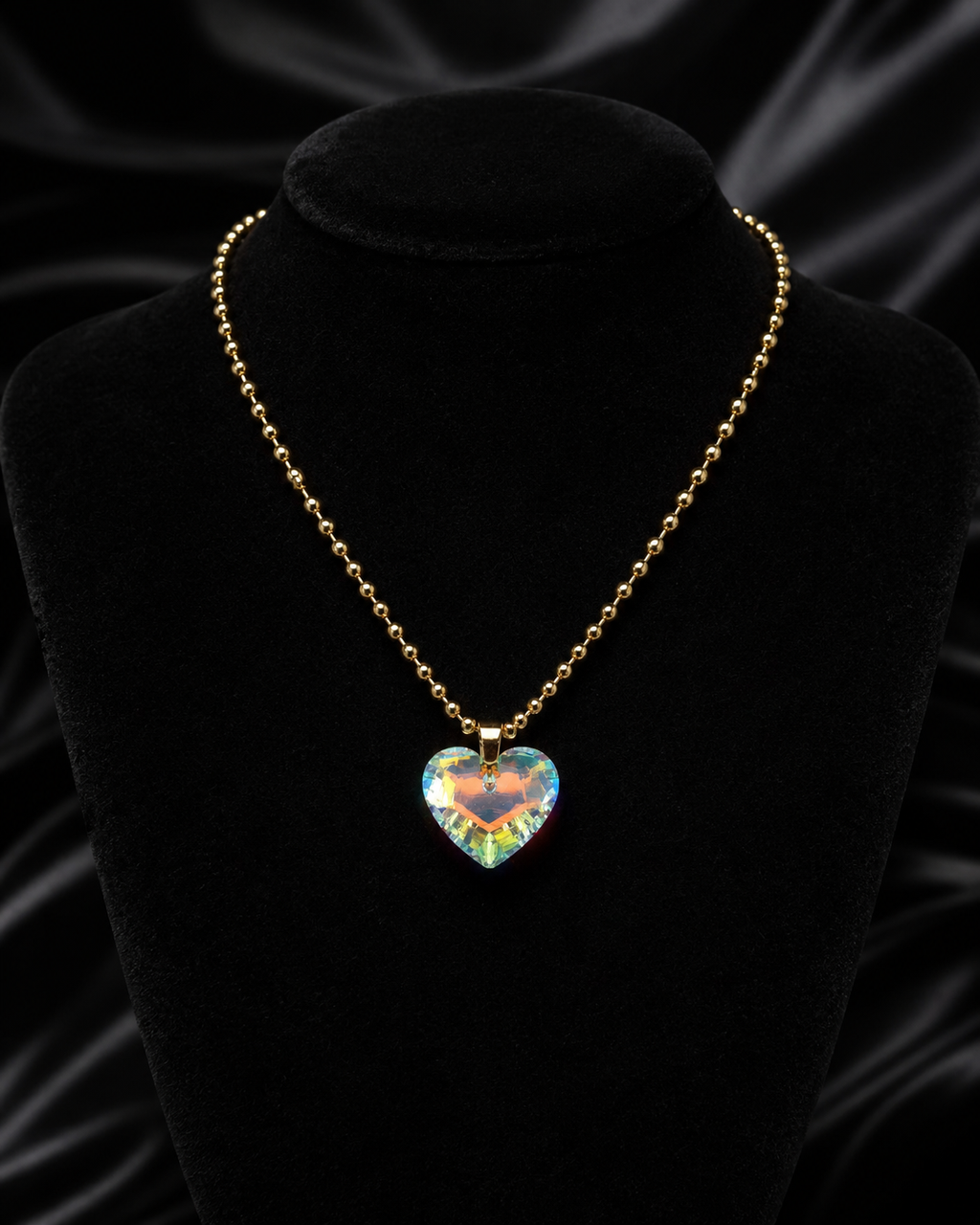 Le collier gros cœur en cristal doré