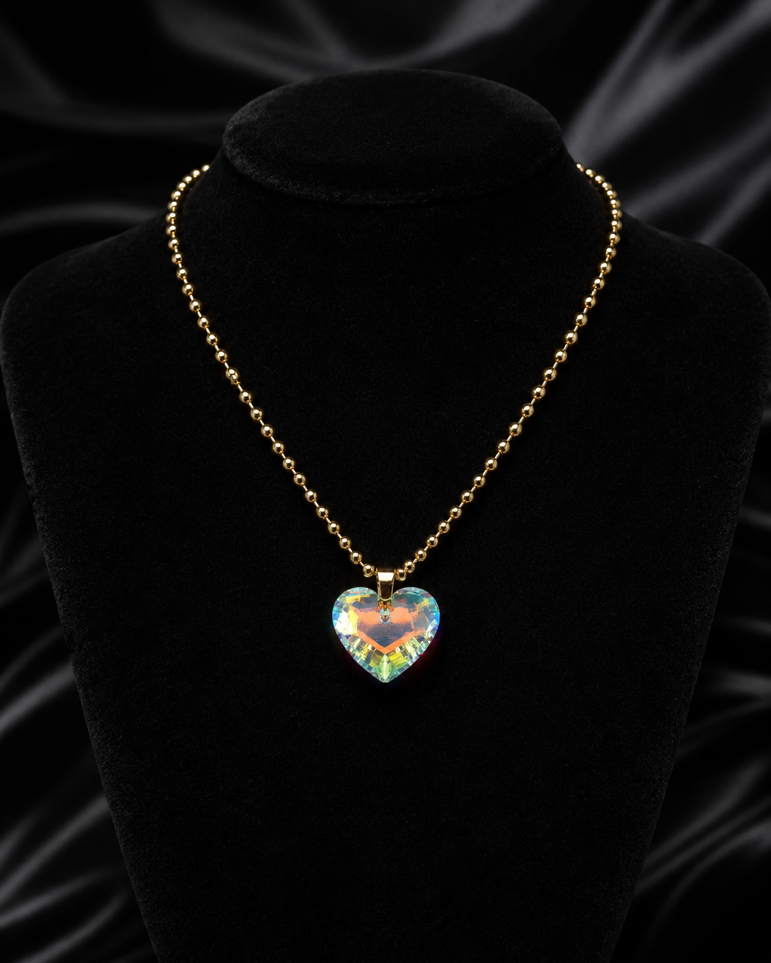 Le collier gros cœur en cristal doré