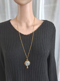 Collier Château Ensorcelé – Sorcière Volante Fluorescente