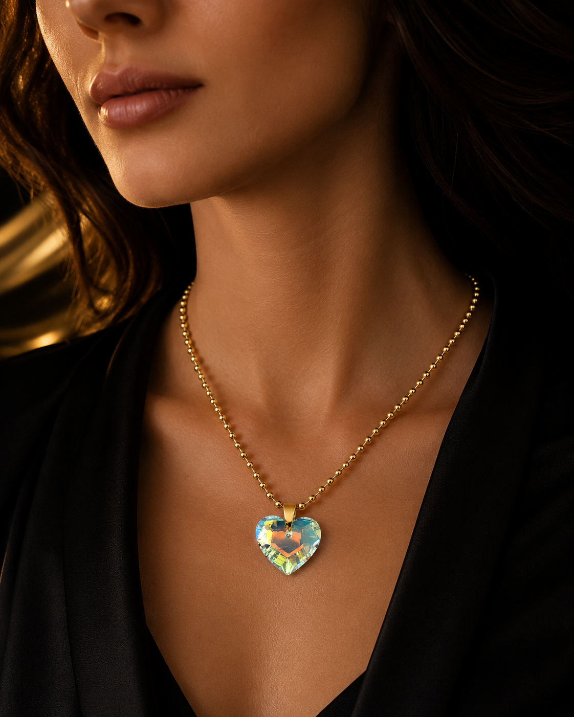 Le collier gros cœur en cristal doré