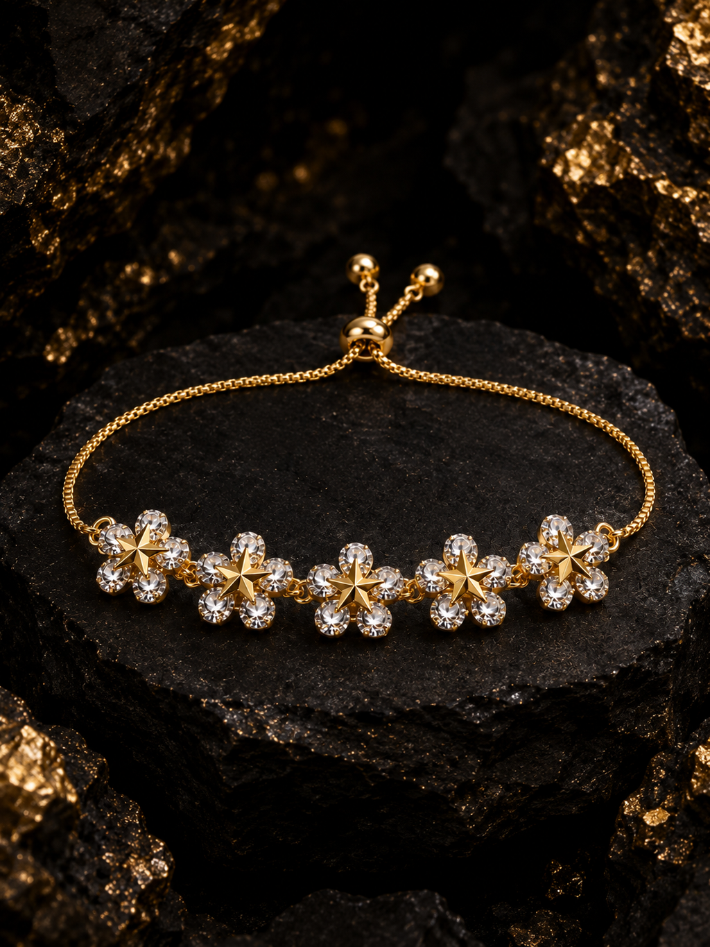 Bracelet floral étoilé doré à 5 oxydes.