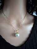 Collier or enchanté prunelle verte