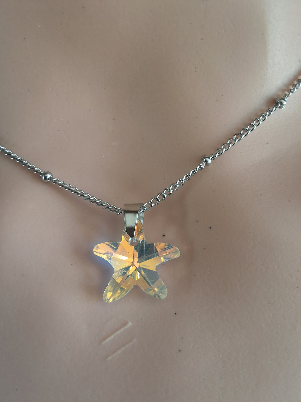 Collier petite étoile de mer en cristal argent